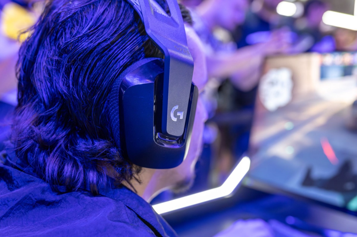 German gaming headset with a laptop and controller