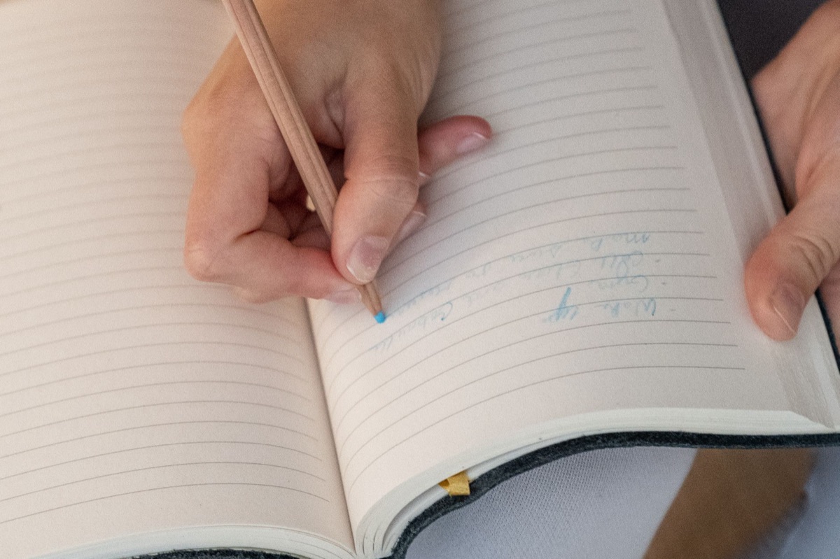 Study notebook with German and English text